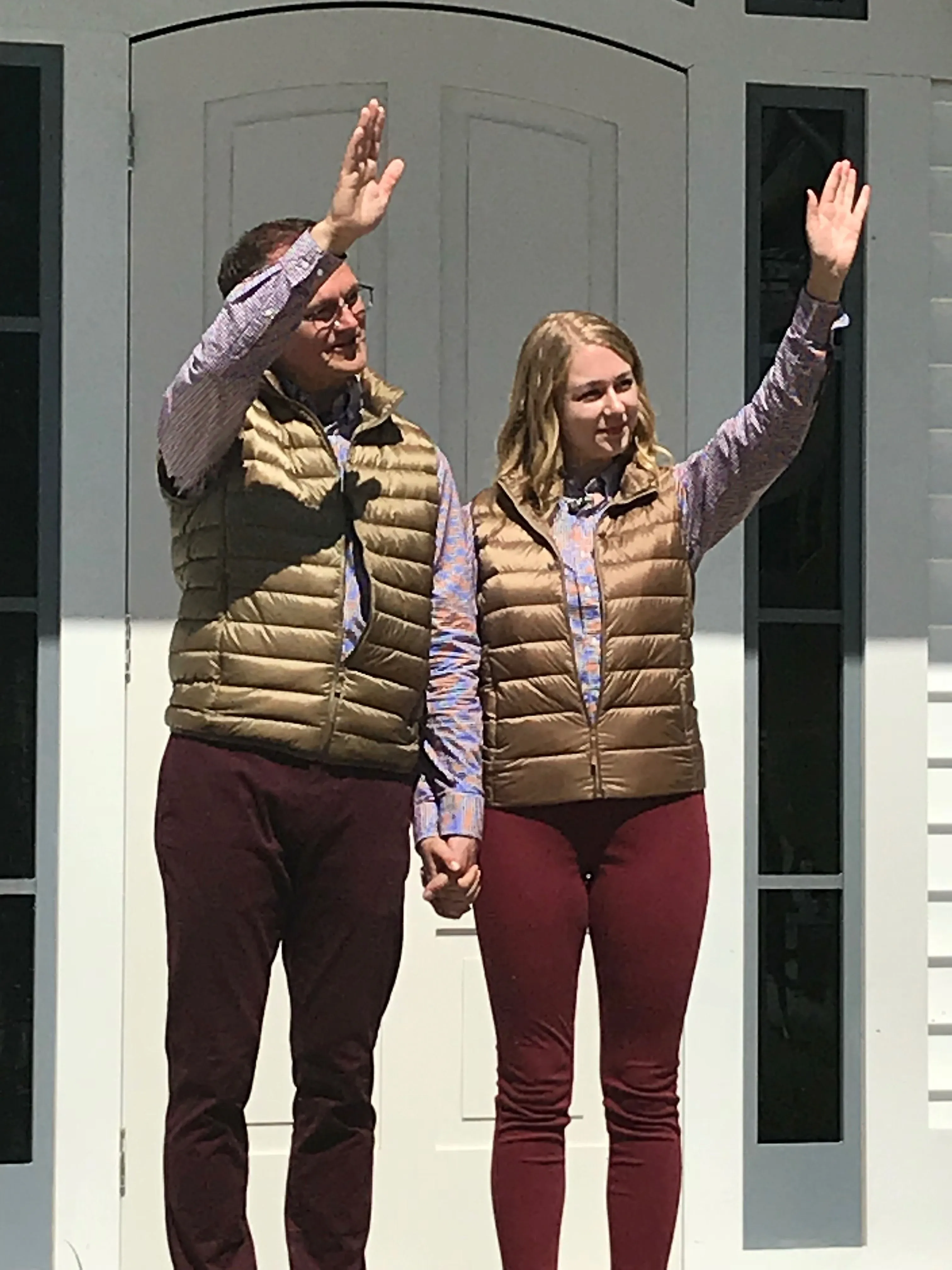 Katie Peabody as Lillith with another performer, arms raised, in the Castle Rock Experience for Hulu