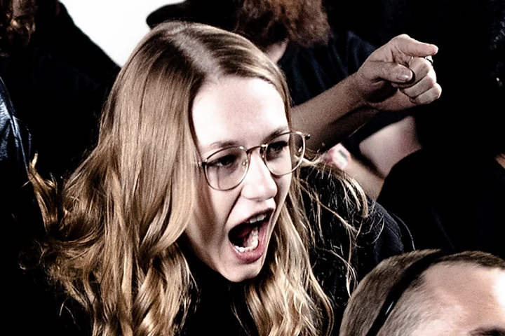 Katie Peabody as Cousin mid-scream among the company of The Why, created by Dakota Loesch